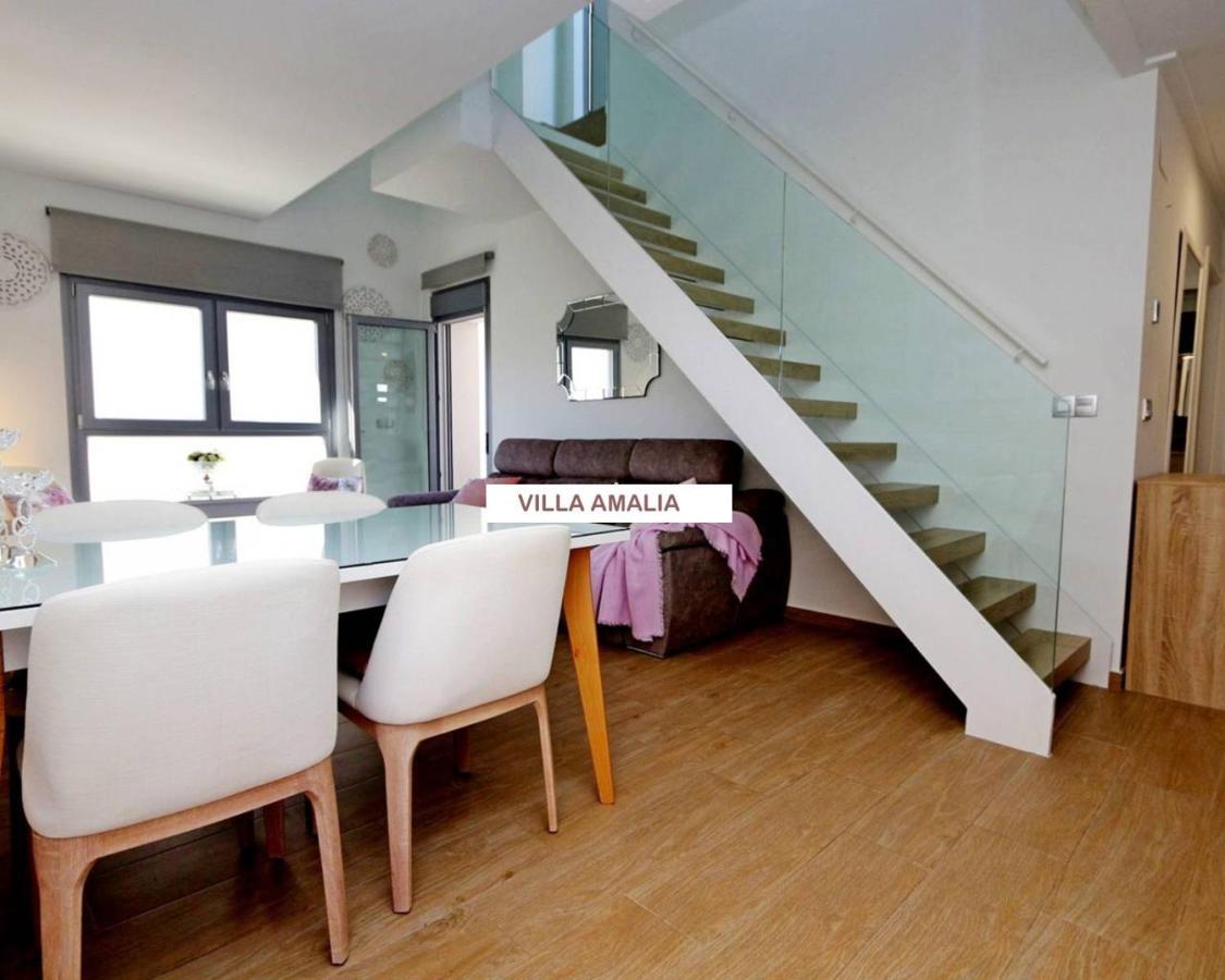 Beach Apartment Amalia Торрев'єха Екстер'єр фото