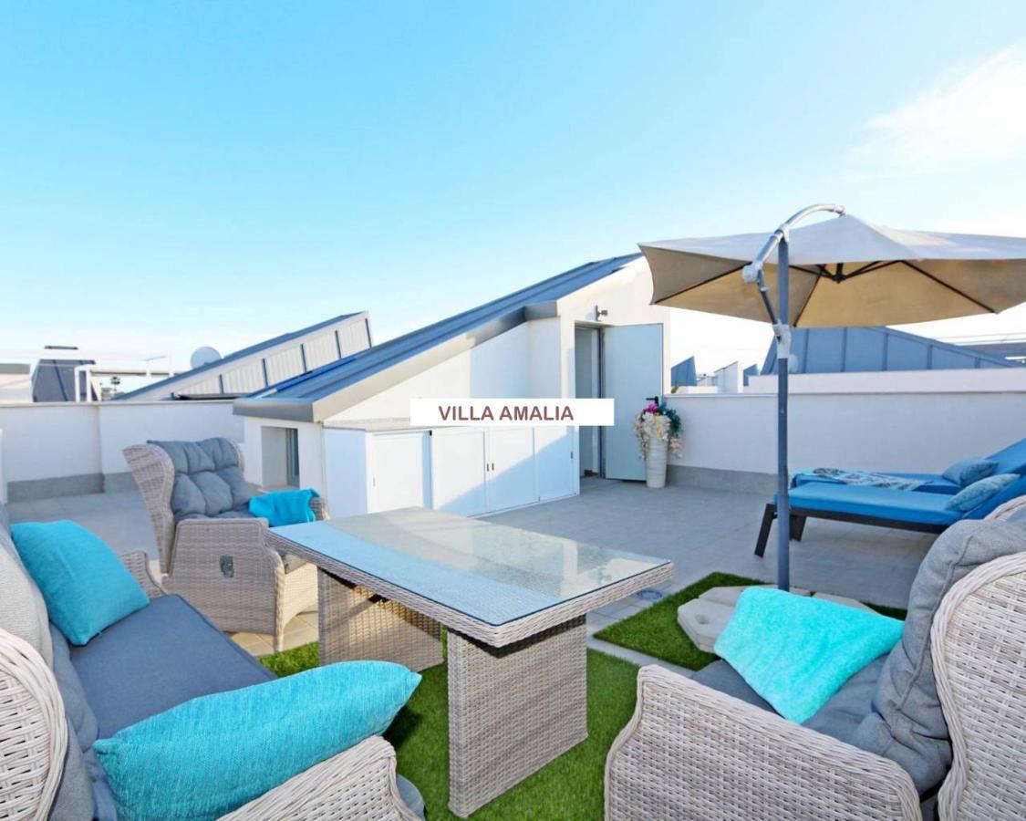 Beach Apartment Amalia Торрев'єха Екстер'єр фото